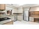 Well-equipped kitchen, offering ample cabinetry and granite countertops at 3472 Country Walk Dr, Port Orange, FL 32129