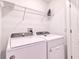 Laundry room with Whirlpool washer and dryer at 832 Longboat Dr, Davenport, FL 33896