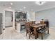 Bright dining area with wooden table, chairs, and bench seating at 3520 Saxony Ln, Saint Cloud, FL 34772