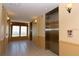 Building hallway with elevators and large windows at 8125 Resort Village Dr # 3514, Orlando, FL 32821