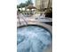 Relaxing hot tubs with patio furniture nearby at 8125 Resort Village Dr # 3514, Orlando, FL 32821