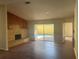 Living room with fireplace and view of the pool at 5033 Bermuda Cir # 9, Orlando, FL 32808