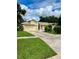 Single story house with attached two car garage at 836 Rosemere Cir, Orlando, FL 32835