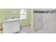 Clean bathroom with white vanity and marble shower at 5351 E Johnson Ave, Haines City, FL 33844