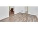 Living room with hardwood floors and an armchair at 5351 E Johnson Ave, Haines City, FL 33844