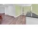 Small galley kitchen with granite countertop at 5351 E Johnson Ave, Haines City, FL 33844