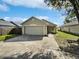 House exterior with a driveway at 8742 Foley Dr, Orlando, FL 32825