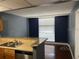 Kitchen with granite countertops, stainless steel appliances, and breakfast bar at 151 E Washington St # 322, Orlando, FL 32801