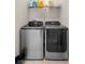 Laundry room with a washer and dryer at 1820 Holden Ridge Ln, Clermont, FL 34715