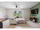 Spacious living room with L-shaped sofa and backyard view at 1820 Holden Ridge Ln, Clermont, FL 34715