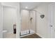 Bathroom with tiled shower and single vanity at 1820 Holden Ridge Ln, Clermont, FL 34715