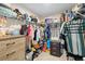 Walk in closet with shelving and hanging rods at 1820 Holden Ridge Ln, Clermont, FL 34715