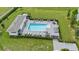 Community pool with surrounding patio and lounge chairs at 1820 Holden Ridge Ln, Clermont, FL 34715