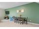 Dining area with table and chairs, and accent wall at 1820 Holden Ridge Ln, Clermont, FL 34715
