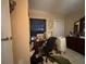 Bedroom with desk, dresser, and window at 1117 E Hubbard Ave, Deland, FL 32724