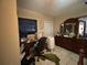 Bedroom with desk, dresser, and window at 1117 E Hubbard Ave, Deland, FL 32724