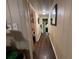 Long hallway with wood flooring at 1117 E Hubbard Ave, Deland, FL 32724