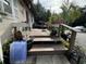 Wooden deck with stairs leading to the yard at 1117 E Hubbard Ave, Deland, FL 32724