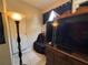 Bedroom with large TV and dresser at 1117 E Hubbard Ave, Deland, FL 32724