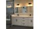 Modern bathroom with double vanity and glass shower at 1420 Lake Harney Rd, Geneva, FL 32732