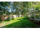 Spacious backyard with a shed and wooden fence at 108 Clear Lake Cir, Sanford, FL 32773