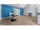 Dining area with wood-look flooring and a view of the kitchen at 108 Clear Lake Cir, Sanford, FL 32773
