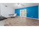 Bright dining area with wood-look flooring and modern table and chairs at 108 Clear Lake Cir, Sanford, FL 32773