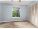 Simple bedroom with wood-look flooring and a ceiling fan at 108 Clear Lake Cir, Sanford, FL 32773