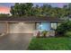 Cute light blue house with attached garage at 108 Clear Lake Cir, Sanford, FL 32773