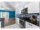 Updated kitchen with stainless steel appliances and granite countertops at 108 Clear Lake Cir, Sanford, FL 32773