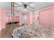 Well-lit bedroom with mirrored closet doors and a large bed at 108 Clear Lake Cir, Sanford, FL 32773