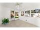 Sunroom with tiled floors, windows, and a ceiling fan at 108 Clear Lake Cir, Sanford, FL 32773