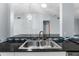 Kitchen with a double sink and granite countertop at 108 Clear Lake Cir, Sanford, FL 32773