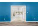 Bright sunroom with French doors and wood-look flooring at 108 Clear Lake Cir, Sanford, FL 32773