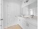 Modern bathroom with double vanity and updated fixtures at 7883 Sw 138Th Street Rd, Ocala, FL 34473