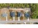 Aerial view of four new homes with gray roofs at 7883 Sw 138Th Street Rd, Ocala, FL 34473