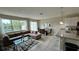 Spacious living area with open floor plan to kitchen at 3167 Tocoa Cir, Kissimmee, FL 34746