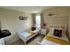 Two twin beds with themed bedding and a wall featuring Disney characters at 3167 Tocoa Cir, Kissimmee, FL 34746