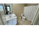 Clean bathroom with toilet, sink, and shower at 3167 Tocoa Cir, Kissimmee, FL 34746