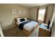 Bedroom with a full-size bed, nightstand and neutral decor at 3167 Tocoa Cir, Kissimmee, FL 34746