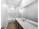 Clean bathroom with a bathtub, toilet and vanity at 6122 Dolostone Dr, Lakeland, FL 33811