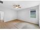Spacious bedroom with carpeted floors and ceiling fan at 6122 Dolostone Dr, Lakeland, FL 33811
