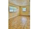 Living room with tile flooring and multiple windows at 117 N Observatory Dr, Orlando, FL 32835