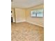 Spacious living room with tile flooring and large windows at 117 N Observatory Dr, Orlando, FL 32835