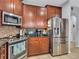 Kitchen boasts stainless steel appliances and ample cabinetry at 1890 Altavista Cir, Lakeland, FL 33810