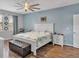 Spacious main bedroom with king-size bed and ceiling fan at 1890 Altavista Cir, Lakeland, FL 33810