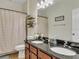 Bathroom with double vanity and granite countertops at 1890 Altavista Cir, Lakeland, FL 33810