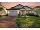 Two-story house with brick driveway at 1890 Altavista Cir, Lakeland, FL 33810