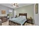 Guest bedroom with a full bed and dark wood furniture at 1890 Altavista Cir, Lakeland, FL 33810