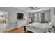 Main bedroom with a king-size bed and en-suite bathroom access at 1890 Altavista Cir, Lakeland, FL 33810